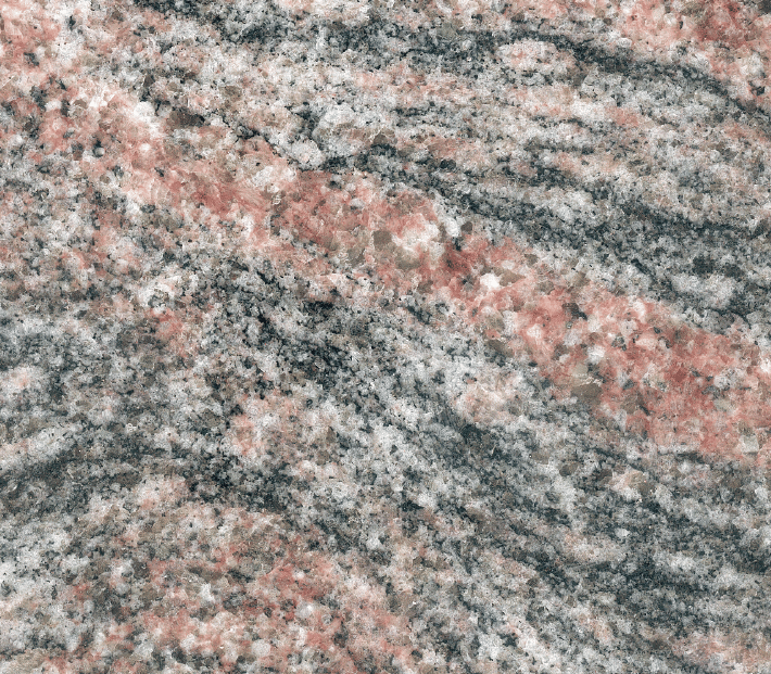 Die typische Farberscheinung des Migmatit Kinawa Classico ist ein Grau mit rotvioletten Sekundärfarben. Foto: Abraxas Stone Experts / Giessen